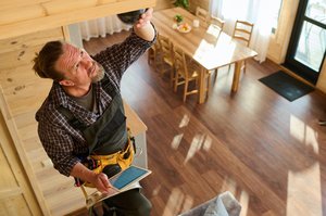 mature-fitterman-in-coveralls-and-checkered-shirt-2025-03-13-22-28-32-utc